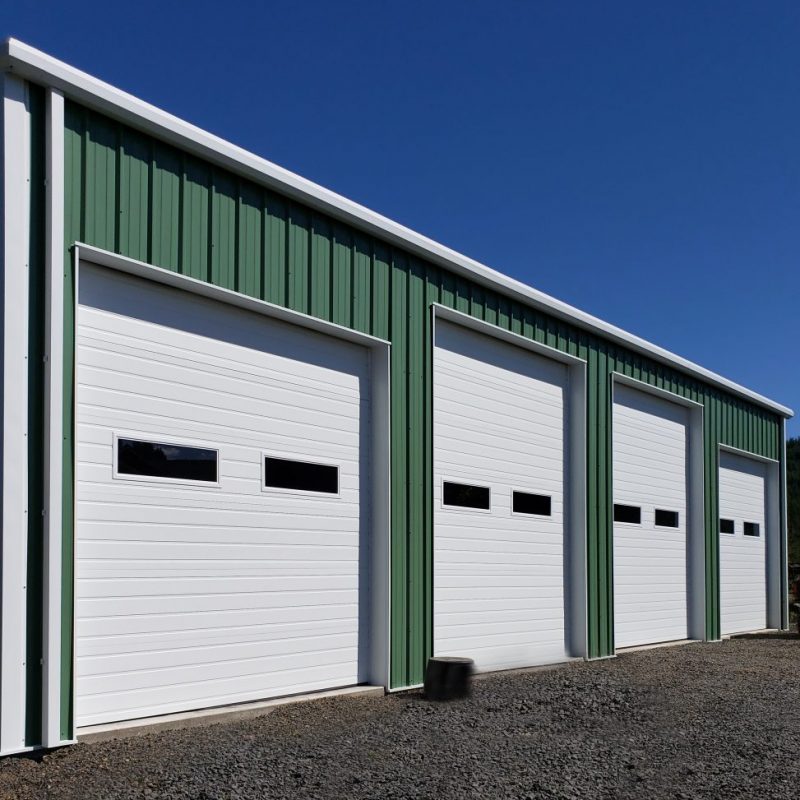 Equipment Storage Steel Building with Rollup Doors - Exterior Photo